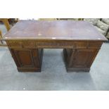 A 19th Century French carved walnut library desk