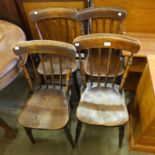 A set of four Victorian elm and beech kitchen chairs