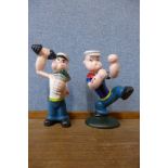 A pair of painted cast iron Popeye figures