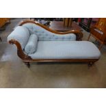 A Victorian mahogany and fabric upholstered chaise longue