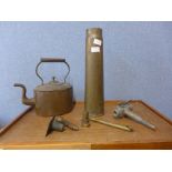 A copper kettle, a brass shell case, etc.