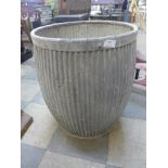 A galvanised dolly tub