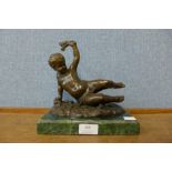 A French style bronze figure of a cherub, on green marble socle