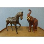 A small leather horse and a leather elephant