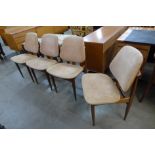 A set of four Elliotts of Newbury teak dining chairs