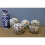 Five oriental famille rose porcelain ginger jars and a blue and white vase