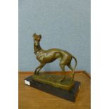 A French bronze figure of a whippet, on black marble plinth