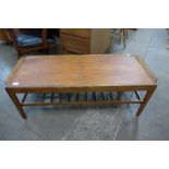 A Remploy teak extending coffee table