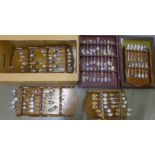 A box of silver plated and other collectors spoons, (one display case and five racks) **PLEASE