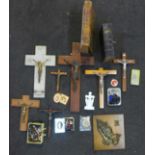 A collection of religious items including rosaries, Bibles, crucifixes, etc.