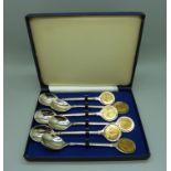 A set of spoons, the outer box signed by Edwina Currie