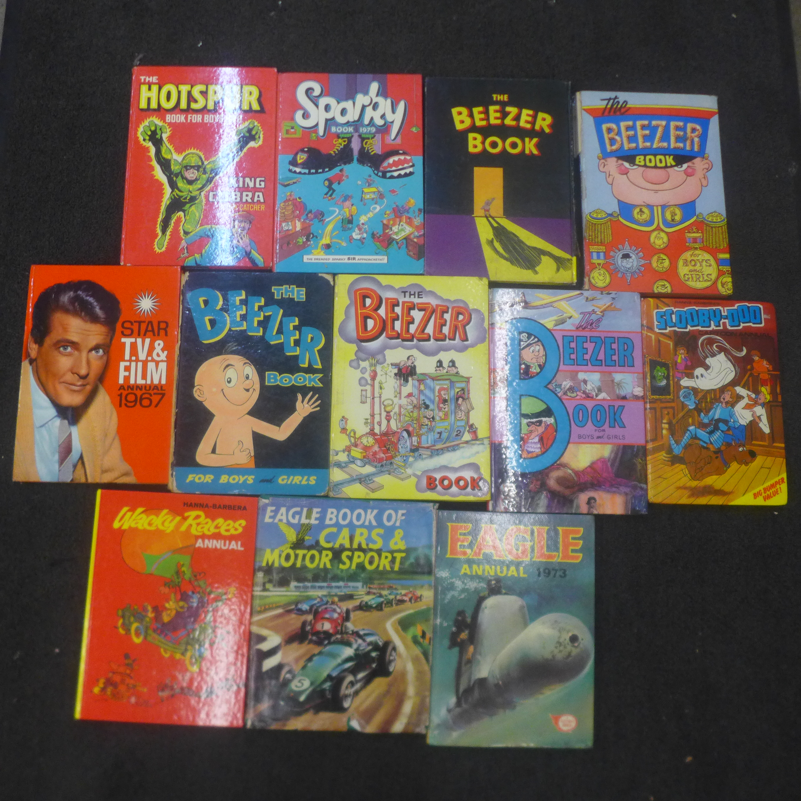 Twelve children's annuals and books including Beezer, Wacky Races, etc., mainly 1960's