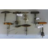 Seven vintage assorted English and German corkscrews including Edward Becker - The Columbus and