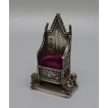 A miniature silver The Coronation Chair pin cushion, Birmingham 1901, height 38mm