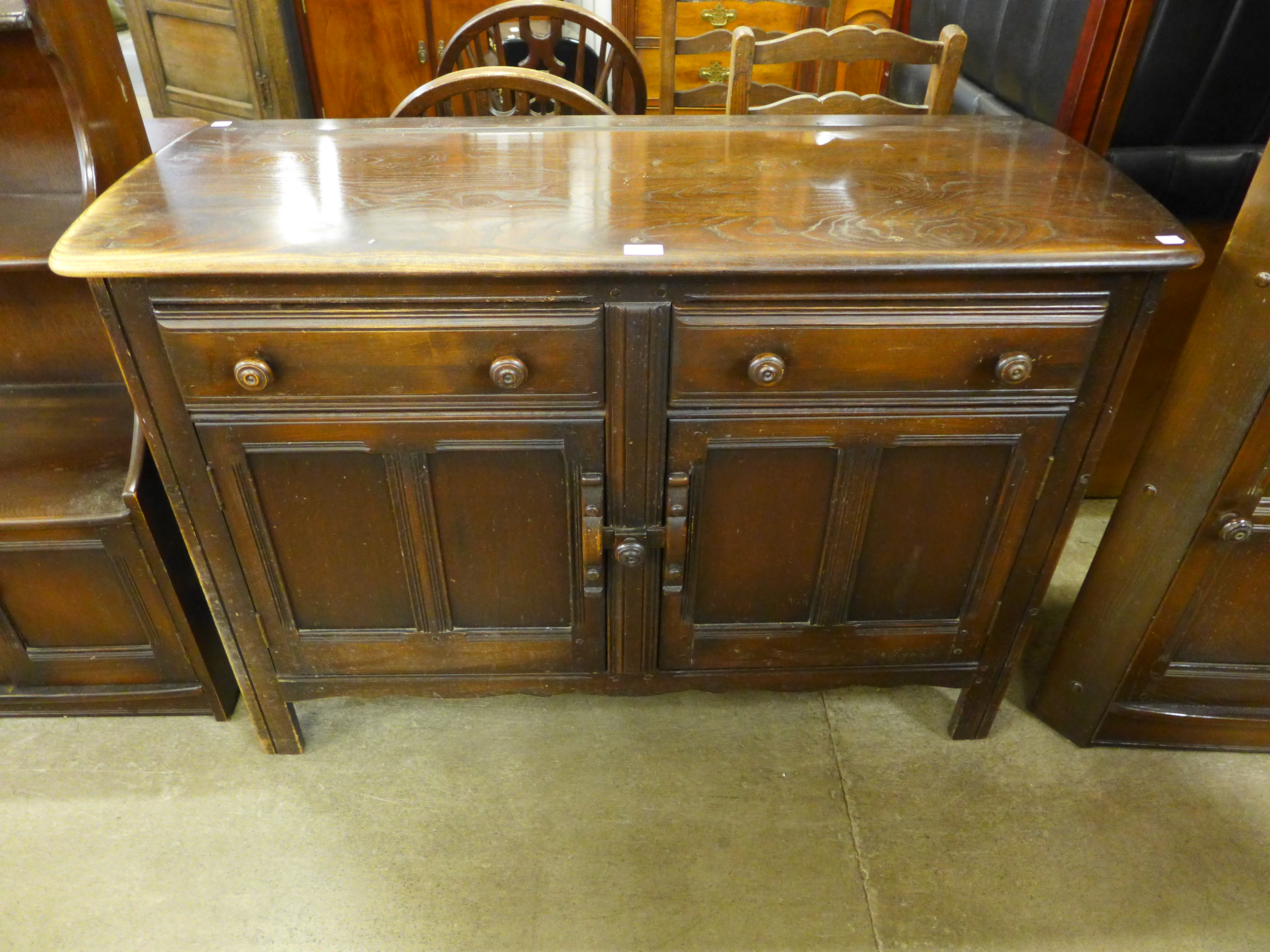 An Ercol dark elm dresser and a corner cabinet - Image 2 of 3