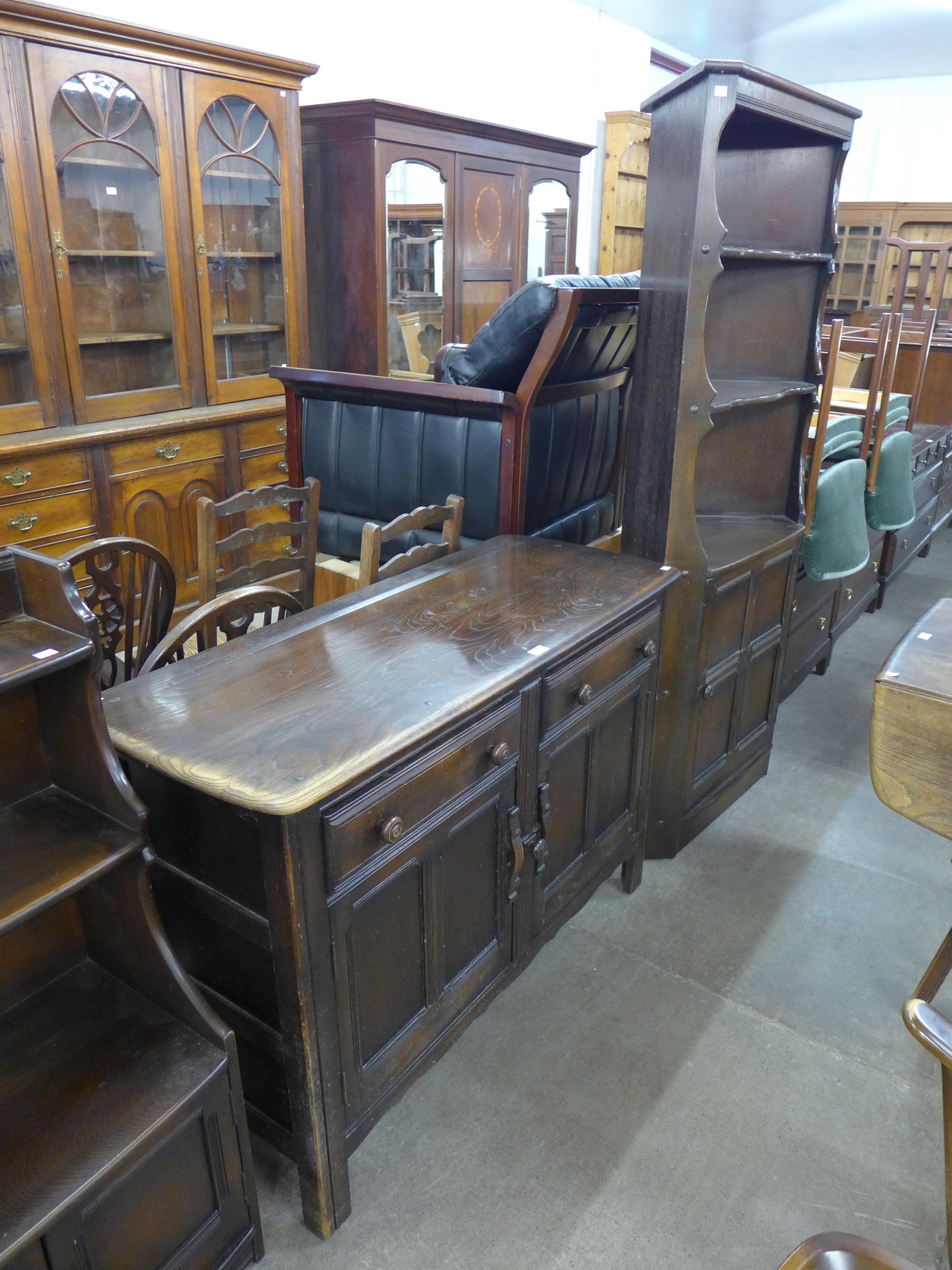 An Ercol dark elm dresser and a corner cabinet