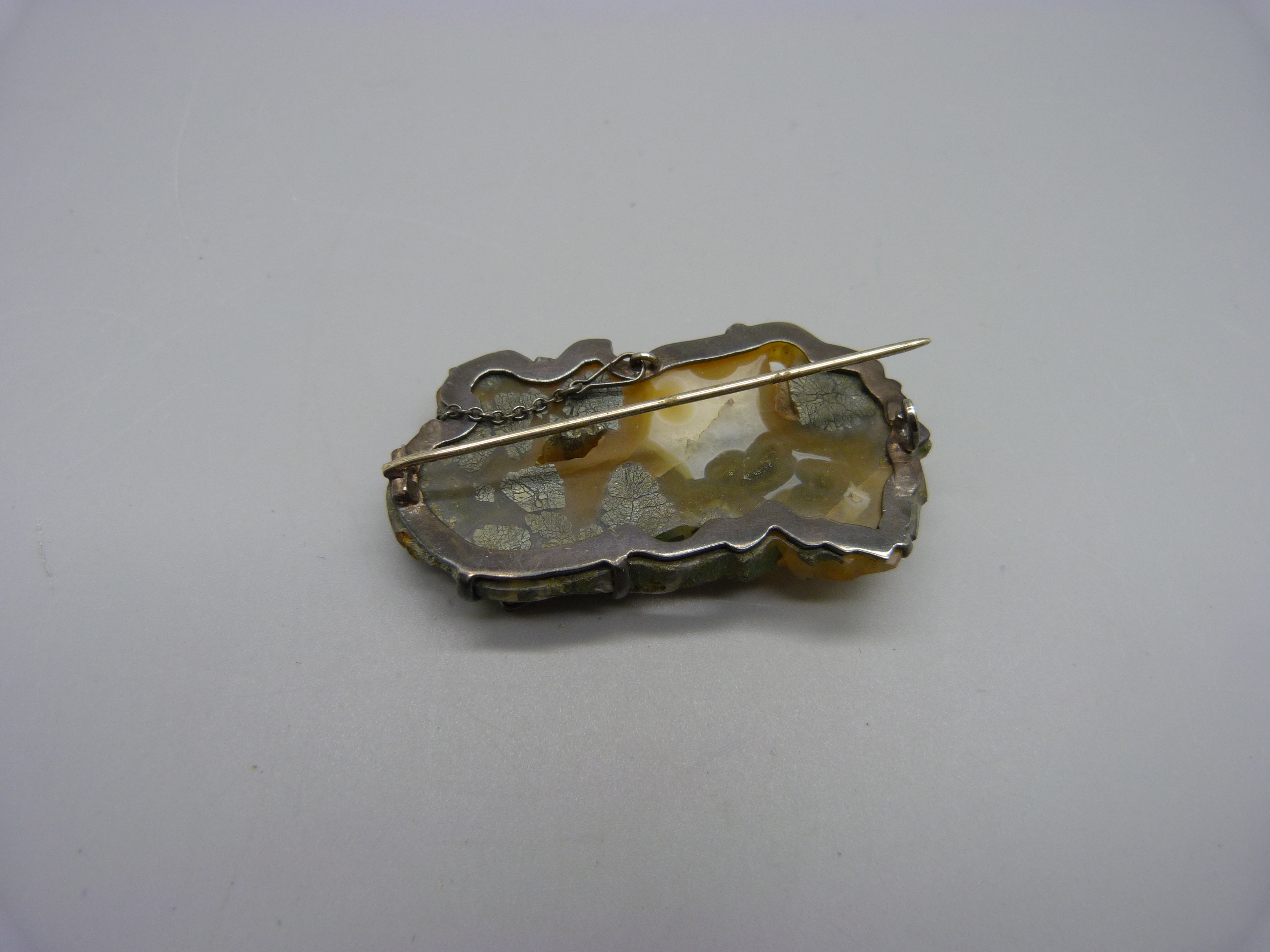 A white metal mounted carved jade brooch - Image 2 of 2