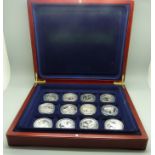 Twelve silver proof coins including crowns and £5 coins