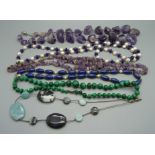 A large amethyst necklace, a lapis lazuli necklace, malachite and silver mounted gem necklaces, etc.