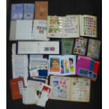 A box of stamp albums, covers, booklets, etc.