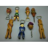Eight assorted figural bottle openers and corkscrews