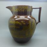 A mid 19th Century water jug with oriental transfer printed decoration, 23cm