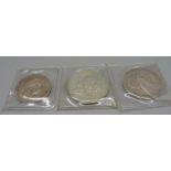 Three silver coins, 65g