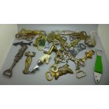 Twenty-five figural and animal themed bottle openers