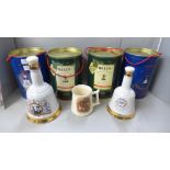 Six full commemorative Bell's whisky decanters, four boxed and a mug, four Royalty related