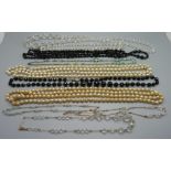 Ten vintage necklaces including crystal, French jet, faux pearls, etc.