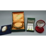 A rolled gold bracelet, a cameo brooch, a pair of 9ct gold earrings and a 9ct gold and silver