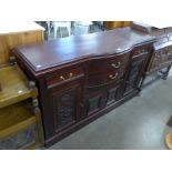 A Victorian style carved hardwood sideboard