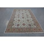 A cream ground rug, 310 x 200cms