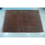 An eastern red ground rug, 200 x 130cms