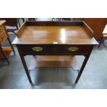 A Victorian mahogany two drawer side table