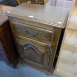 A French oak side cupboard