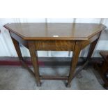 An Arts and Crafts oak hall table