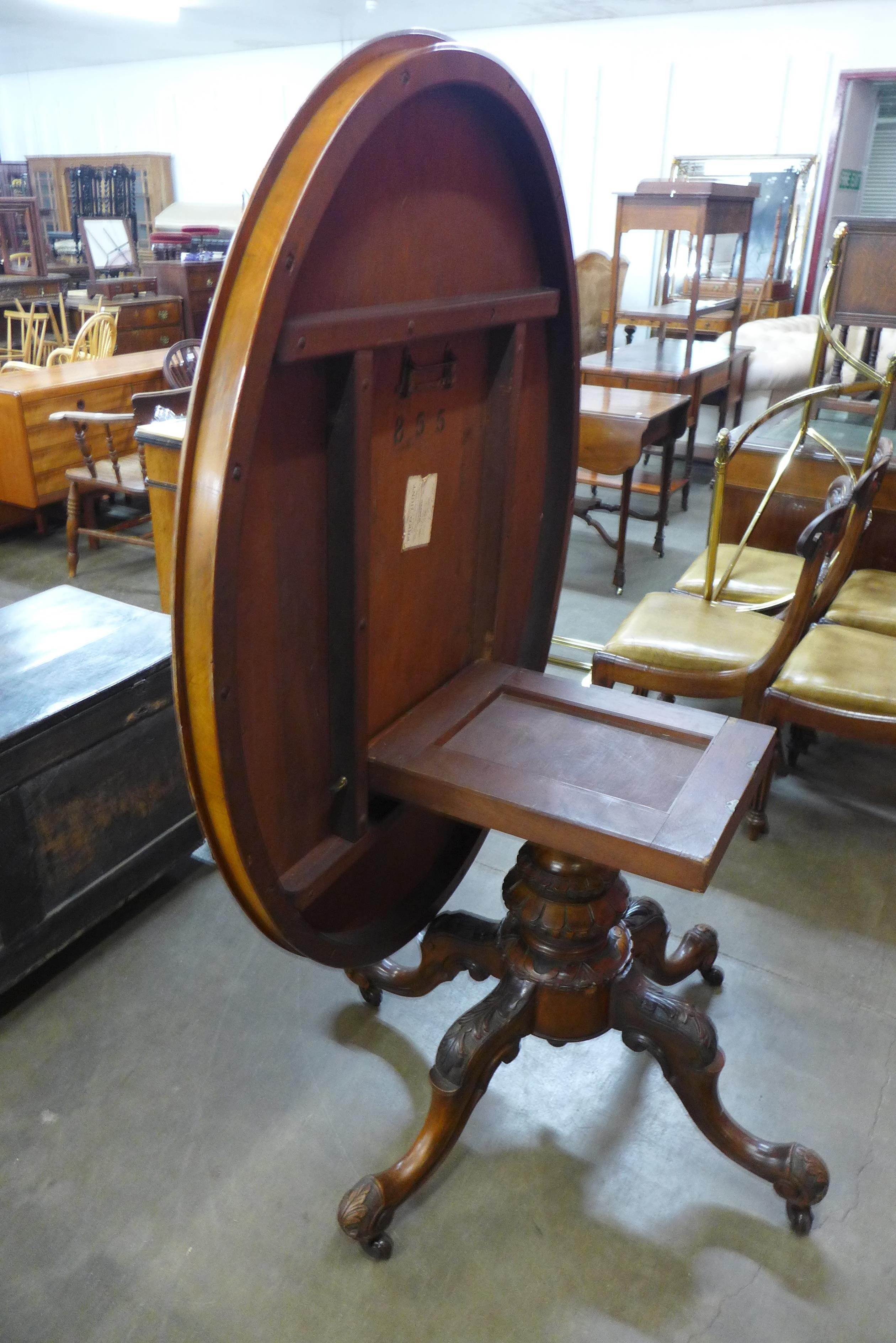A Victorian figured walnut oval tilt-top centre table - Image 2 of 2