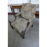 A Gainsborough style carved mahogany and fabric upholstered armchair