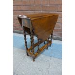 A small oak barleytwist gateleg occasional table