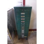 A green metal engineer's cabinet