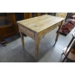 A pine single drawer kitchen table