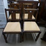 A set of four beech dining chairs