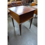 An Edward VII inlaid mahogany metamorphic writing table