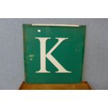 A Perspex 'K' sign