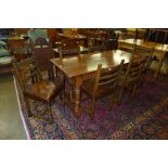 A Titchmarsh & Goodwin Ipswich oak refectory table and six RL8256 model chairs