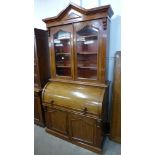 A Victorian mahogany cylinder bureau bookcase