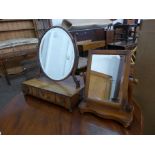 A George III mahogany toilet mirror and a Victorian toilet mirror