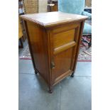 A Victorian walnut pot cupboard