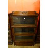 An early 20th Century Globe Wernicke mahogany three tier sectional stacking bookcase